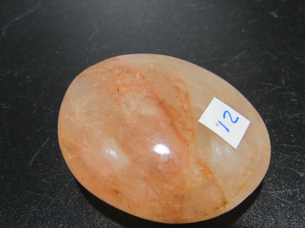 quartz hematoide hematoid quartz galet poli palm stone